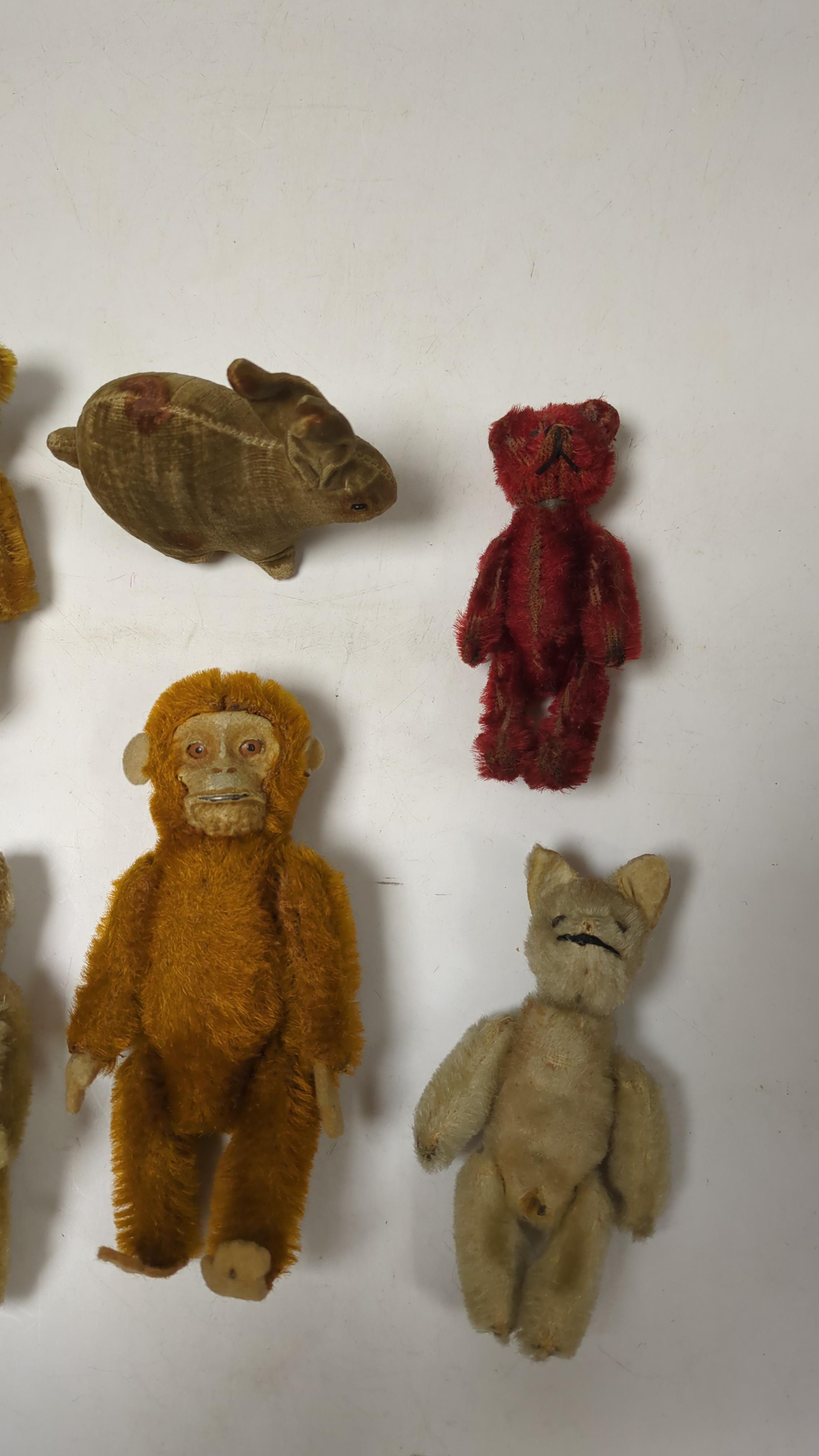 Deans Mickey Mouse and a group of Schuco and Schuco type toy animals (8)
